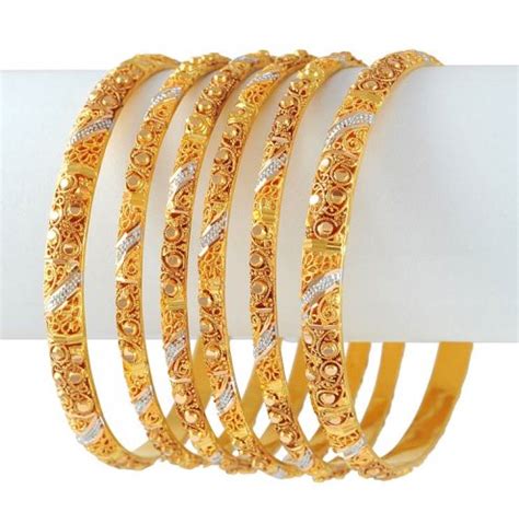 Since ancient times, women have been fond of bangles and wrist adornments, but then those were made from different materials, not necessarily gold or precious metal. JEWELLERY DESIGNS: Latest Design Gold Bangles