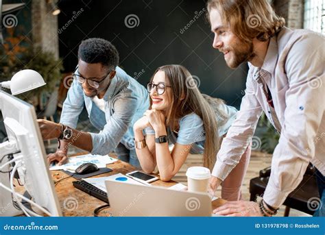 Young Coworkers Working With Computer Indoors Stock Photo Image Of