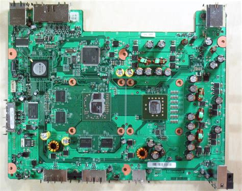 Removing The Heatsinks From The Motherboard Inside Microsofts Xbox 360