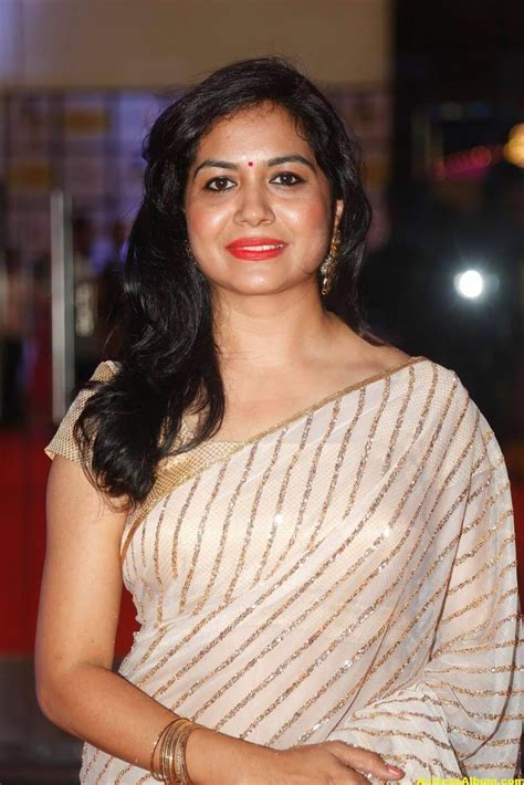 At the age of 6, she got trained in carnatic vocal. Singer Sunitha Latest Stills In White Saree 2 - Actress Album