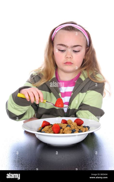 Young Girl Eating Cereal Model Released Stock Photo Alamy
