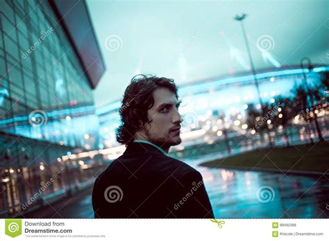 Young Stylish Guy On The Background Of Night City City Lights Stock