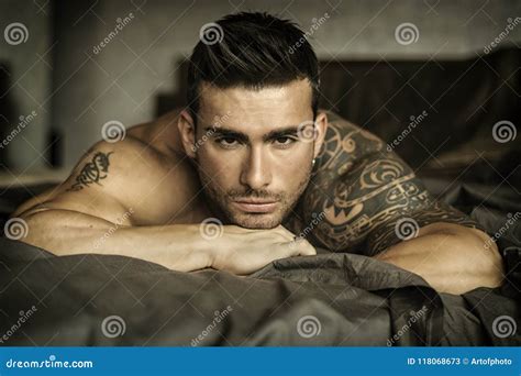 Shirtless Male Model Lying Alone On His Bed Stock Image Image Of Attractive Male 118068673