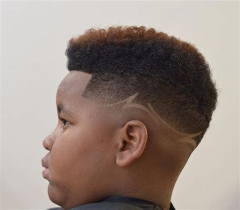 Any boy with thick enough hair can create various styles using the hair on top, while the bottom part adds this is actually an afro hairstyle which is popular among the black people. 40 Black Boys Haircuts