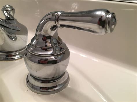 Then, they should carefully remove the faucet and replace any damaged parts. leak - Leaky bathroom faucet - can't find screw on handle ...