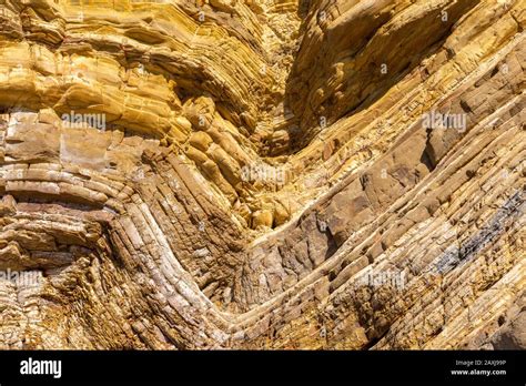 Strata Of Sandstone Sedimentary Rock Coastal Cliff Layers Folded