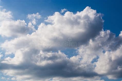 Bright Blue Sky With Clean White Airy Fluffy Clouds On A Summer Day