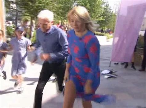 Holly Willoughby Struggles To Stop Her Knickers Flashing While Frantically Running Back To This
