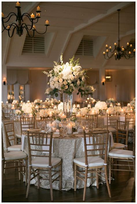 Gold Ivory And White Wedding Reception Decor With White Florals In