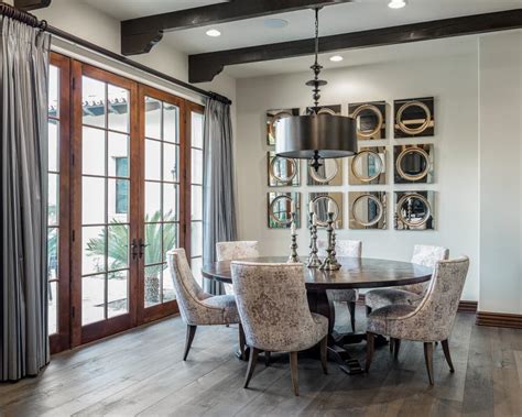 Elegant Dining Room Features French Doors And Gray Hardwood