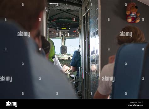Airplane Interior Detail With A View To The Pilots Cabin Stock Photo