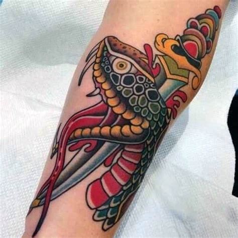 Your resource to discover and connect with designers worldwide. 50 Snake Dagger Tattoo Ideas For Men - Sharp Serpent Designs