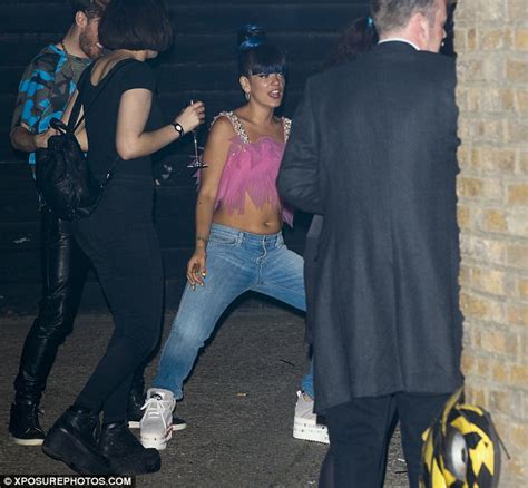 Lily Allen Bares Toned Midriff In Recycled Whacky Pink Top Daily Mail Online