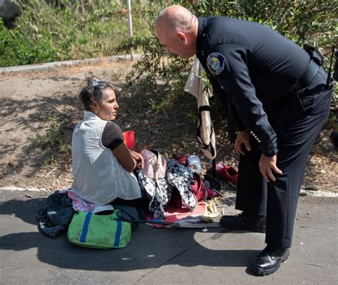 A Homeless Encampment Hidden In The Dark Beneath A Santa Ana Overpass