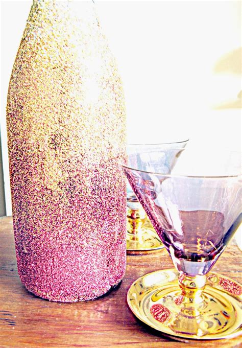 These stemless glitter glasses, in your wedding colors, are fancy enough for any event or wedding. Hunted and Made: DIY Ombre Glitter Champagne Bottle - How To Guide