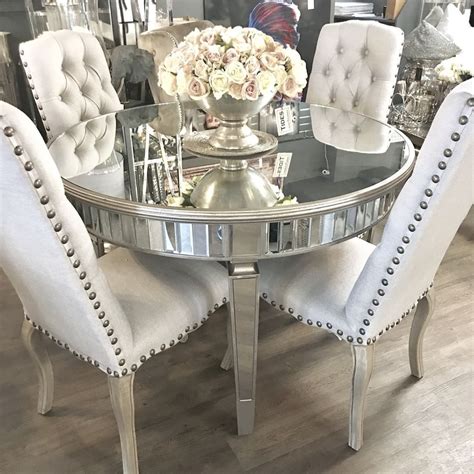 Great savings & free delivery / collection on many items. Mirrored round dining table with champagne gold detailing #diningtable #mirroredfurniture # ...