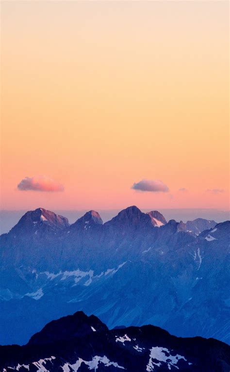 Download Wallpaper 950x1534 Mountains Fog Clean Sky Sunset Iphone
