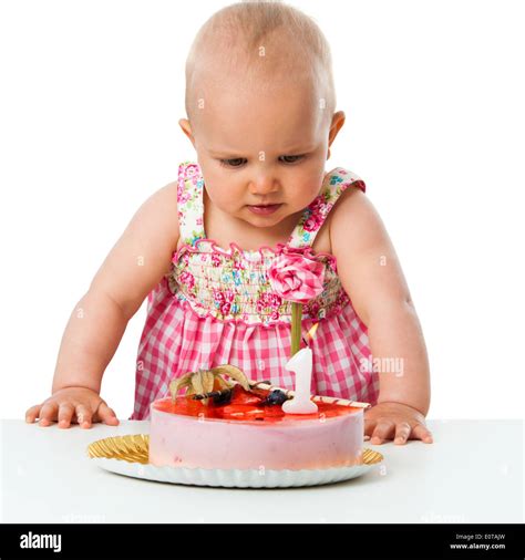 Portrait Of Cute Baby Girl Celebrating First Birthday With Cake