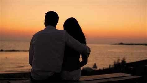 Hd Romantic Couple Sitting Hug And Kiss At Sunset Boy And Girl As A