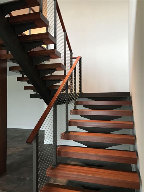 Floating Stairs With Cable Railing And Wood Treads Stairs Staircase
