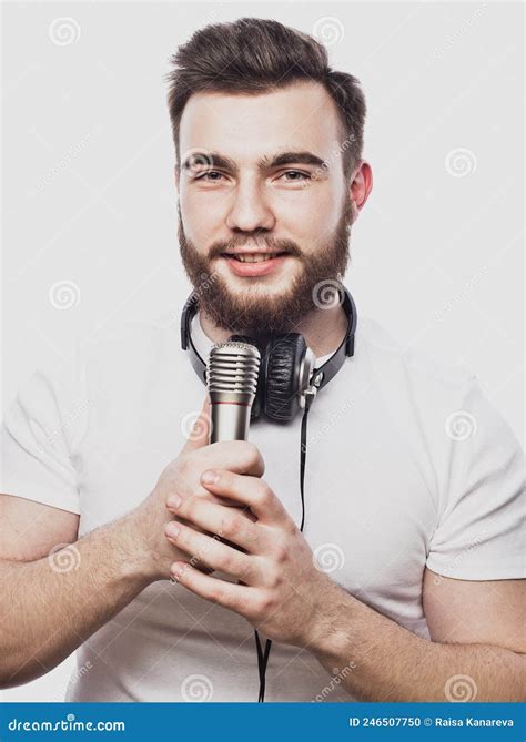 Boy Rocking Out Image Of A Handsome Bearded Man Singing To The Microphone Stock Photo Image
