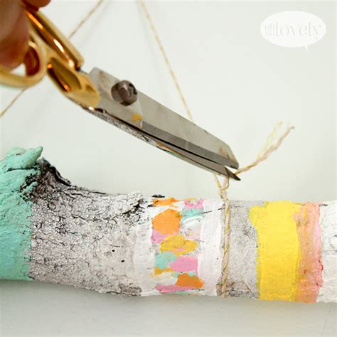 Diy Painted Sticks Wall Hanging Tutorial Oh So Lovely Blog