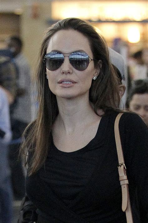 Mother of 6 children and promoter of humanity causes. Angelina Jolie Latest Photos - CelebMafia