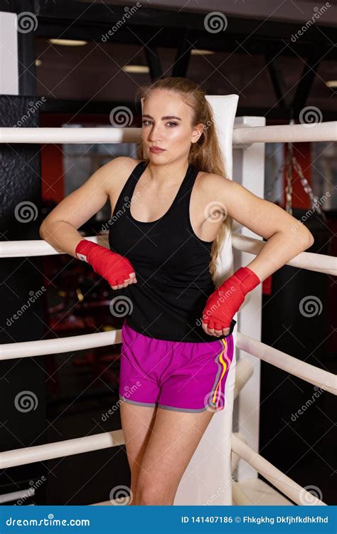 Boxing Girl Stands Leaned On Ropes Of Competition Ring Fashionable