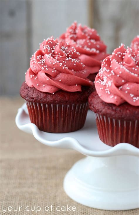 The red color is courtesy of plenty of red food coloring and cocoa powder. Double Red Velvet Cupcakes - Your Cup of Cake