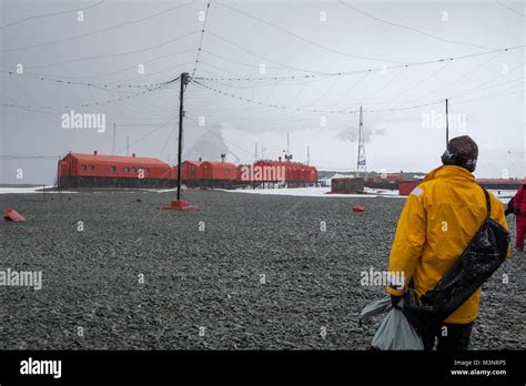 Photographer Walks Toward Antarctic Naval Research Base Antarctica