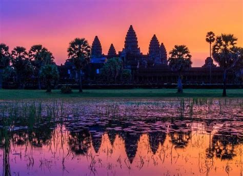 The Sun Sets Over The Mystical Temples Of Angkor Cambodia