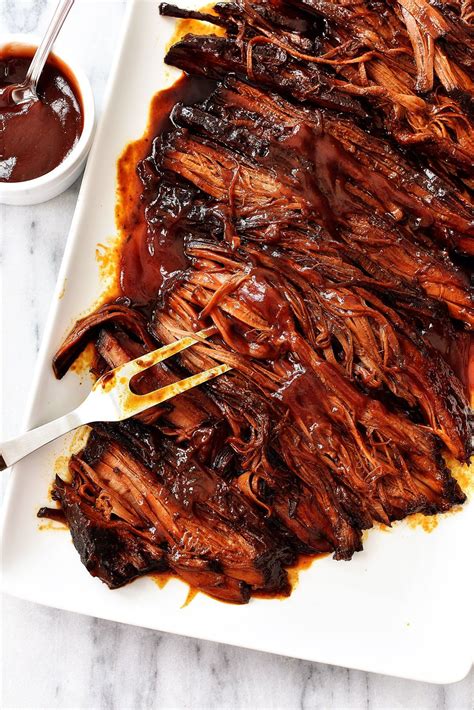 A simple and mouthwatering oven cooked brisket that is truly fuss free! Slow Cooker BBQ Beef Brisket | Slow cooker bbq beef, Beef ...