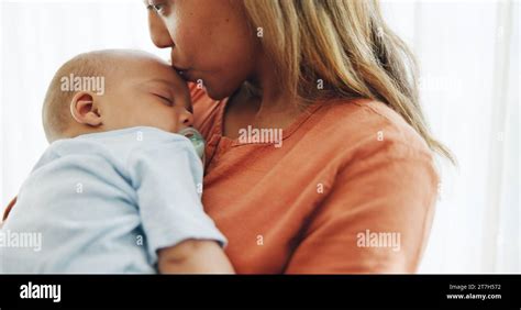 Family, love and mother kiss baby for bonding, healthy relationship and