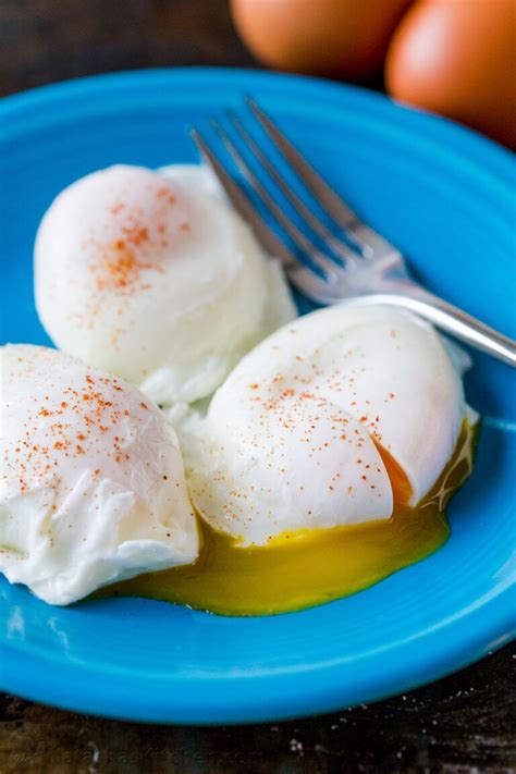 Perfect Poached Eggs Are Firm On The Outside With Golden Liquid Centers