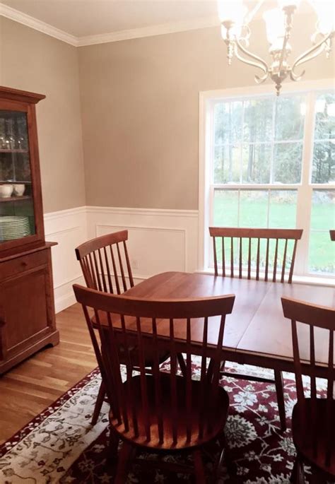 It's a great, neutral choice for those looking for a gray shade with a little bit more body than a light gray. "Anew Gray" by SW. | Family room, Home decor, Dining chairs