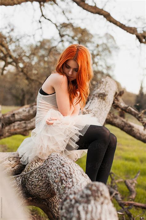 Redhead Girl In A Park By Ellie Baygulov