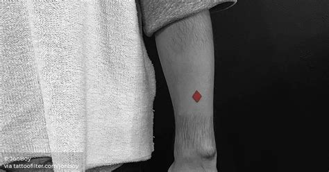 Red Diamond Tattoo On The Left Forearm