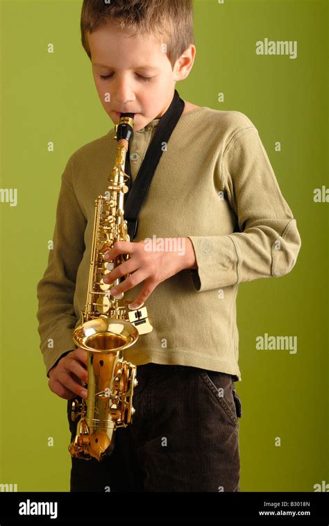Boy Playing Saxophone Stock Photo Alamy