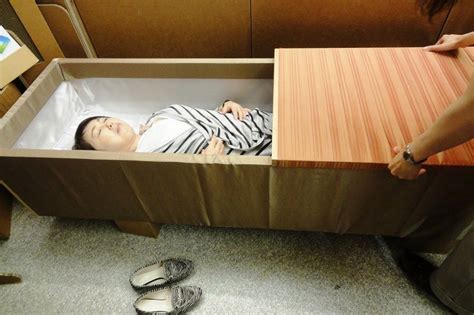 In Japan Living People Are Lying In Coffins