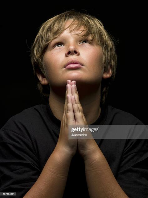 Little Child Praying High Res Stock Photo Getty Images