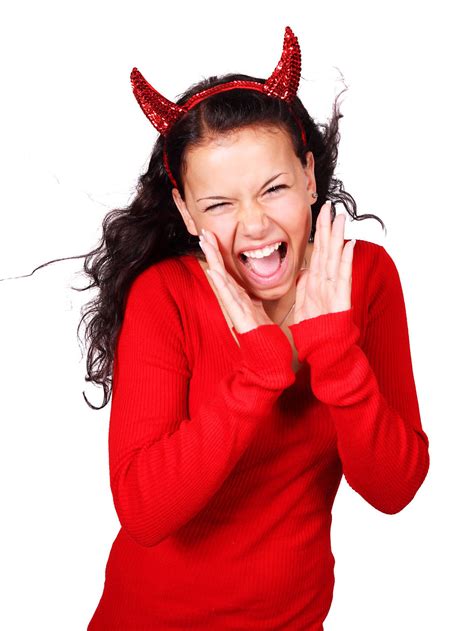Devil Woman Free Stock Photo A Beautiful Girl In A Red Devil