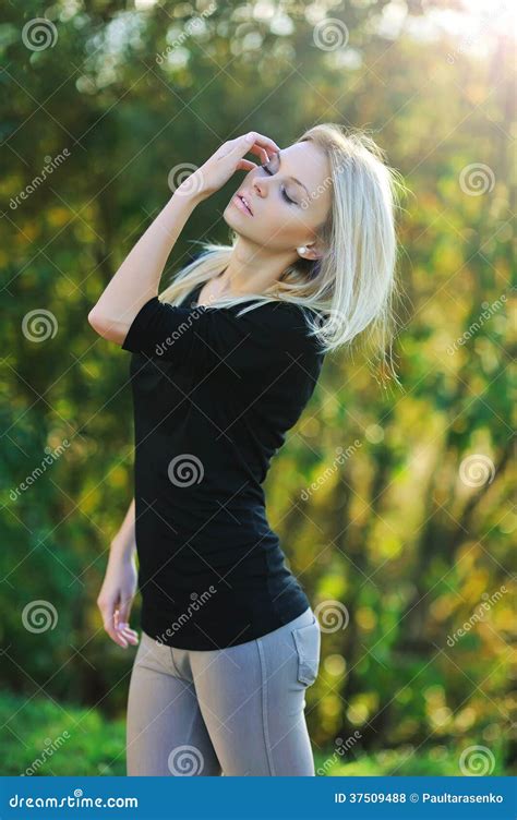 Young Beautiful Girl Posing Outdoors Stock Photo Image Of Attractive