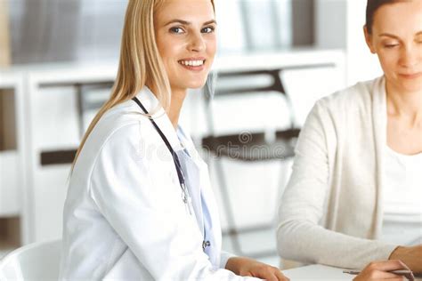 Woman Doctor At Work In Sunny Hospital Is Happy To Consult Female