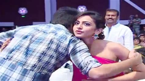 Ram Romantic Tight Hug To Rakul Preet Singh At Pandaga Chesko Audio