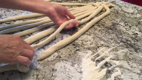 Place 4 of the strips onto the baking sheet. 8 plait bread braid - YouTube