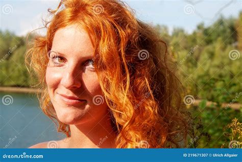 Close Up Portrait Of A Seductive Happy Young Redhead A Beautiful Sensual Woman With Long Curly