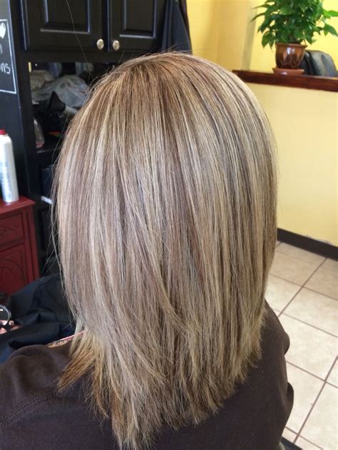 Adding a fringe is a simple way to give a twist to any type of medium length layered hairstyles. Medium length hair with hilights and lowlights by Salon De ...