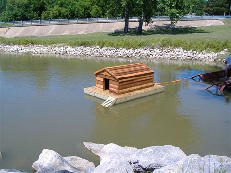 Place wood boards across the top of two planks and drill the boards onto the planks to make a deck. Floating Duck House | Floating Duck Houses For Sale http ...