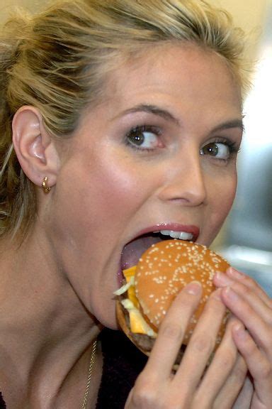 22 Celebrities Stuffing Their Faces With Food