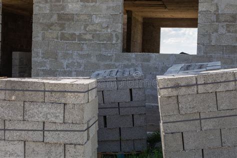 Cinder Blocks For Building A House Are Piled In A Heap Lying On The